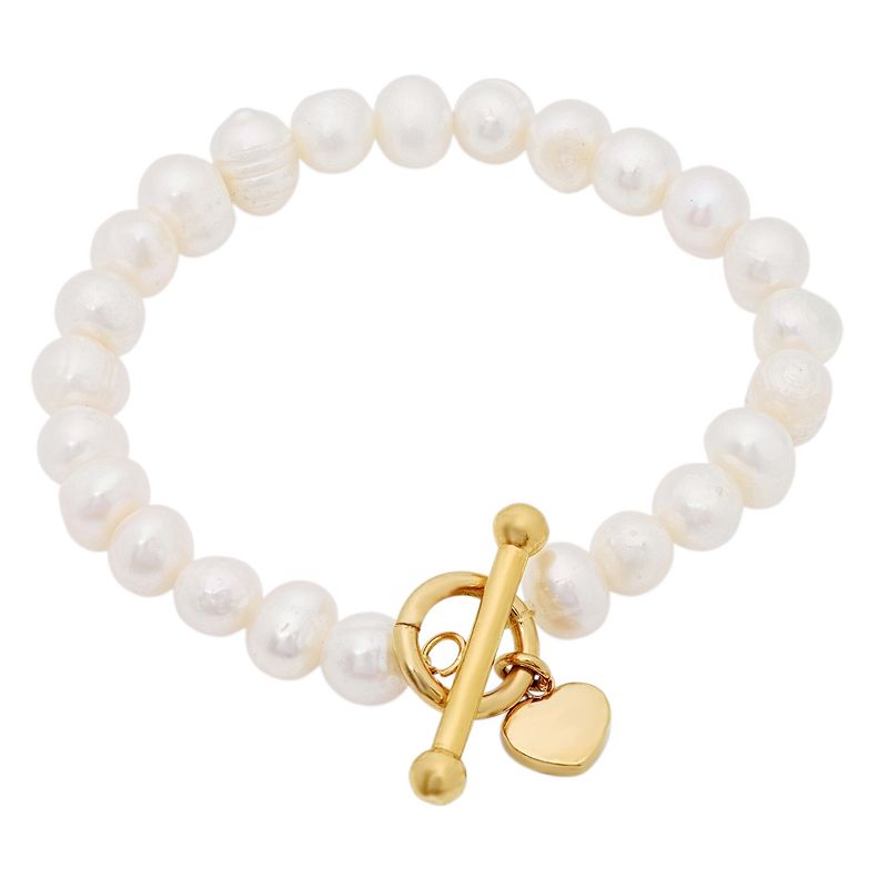 Steeltime Ladies freshewater pearl and 18k gold plated stainless steel heart charm stretch bracelet. Color Options: Silver, Gold