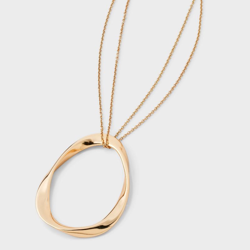 Oval Pendant Necklace - A New Day™ Gold: Lobster Claw Clasp, 32" Length, Zinc Material, Includes 3" Extender
