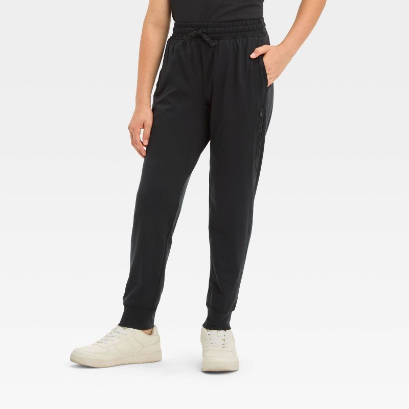 Boys' Soft StretchJogger Pants - All In Motion™ Black Onyx S: Recycled Polyester, Spandex, Moisture Wicking, Quick Drying, Zippered Pocket