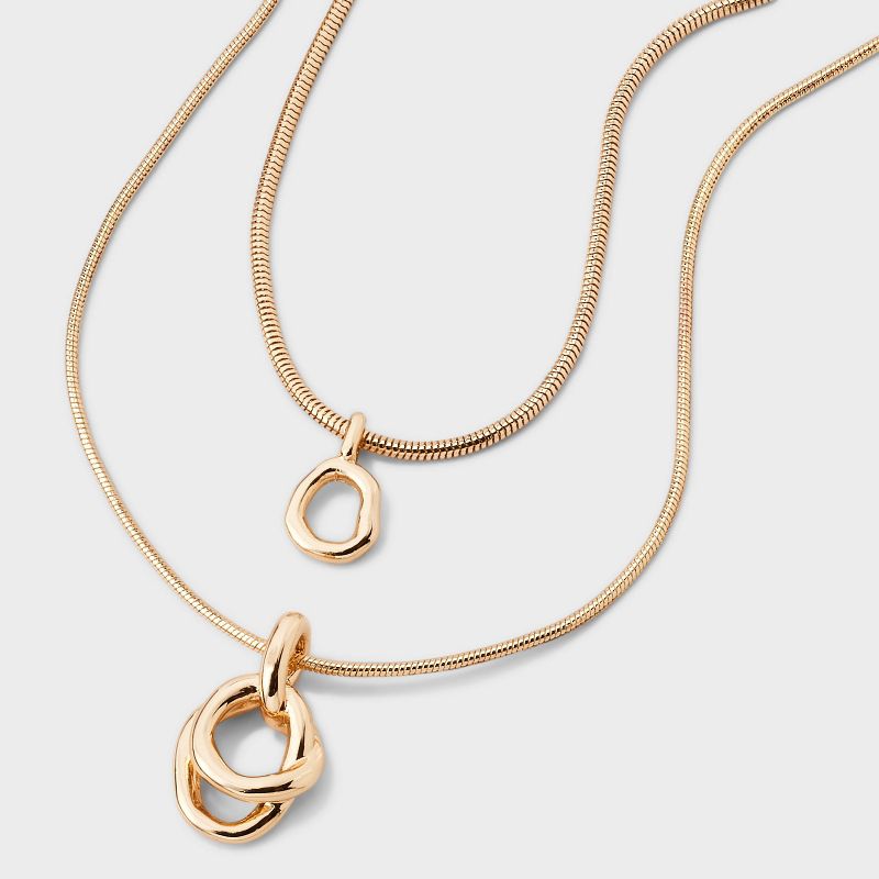 Interlock Circle Pendant Multi-Strand Necklace - A New Day™ Gold: Nickel-Free Metal, Lobster Claw Clasp
